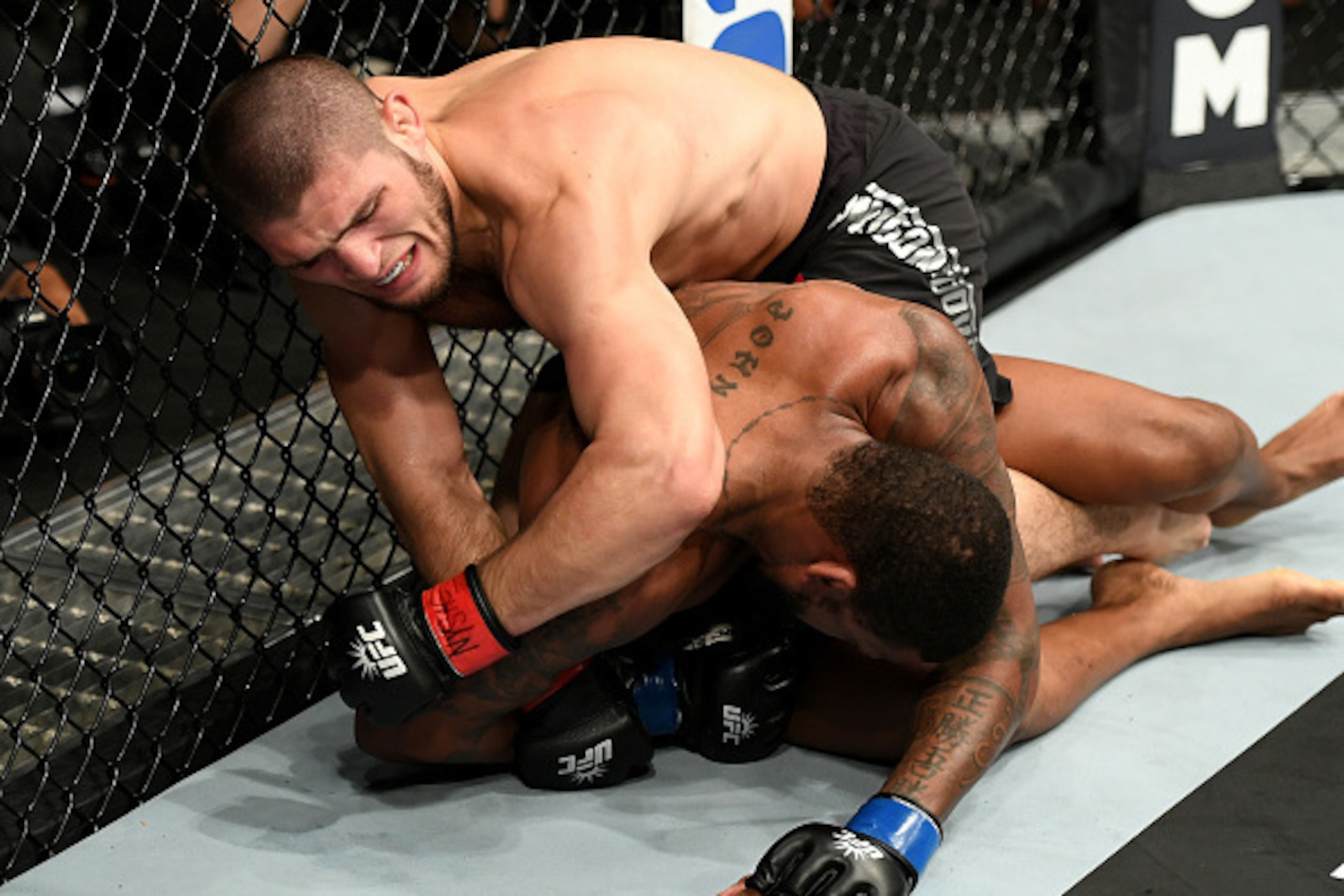 NEW YORK, NY - NOVEMBER 12:  Michael Johnson of the United States (bottom) fights against Khabib Nurmagomedov of Russia in their lightweight bout during the UFC 205 event at Madison Square Garden on November 12, 2016 in New York City.  (Photo by Jeff Bott