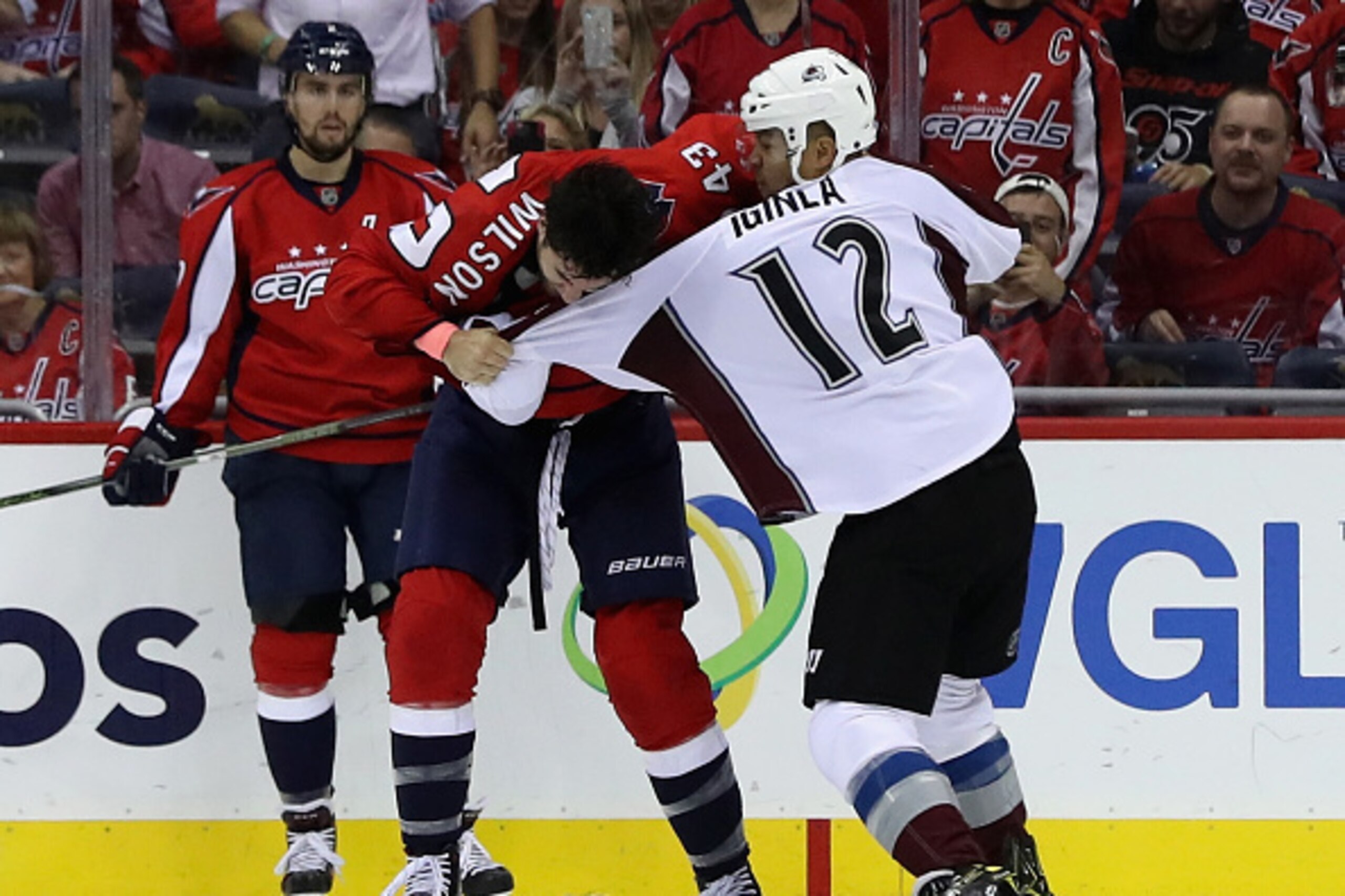 WASHINGTON, DC - OCTOBER 18: Tom Wilson #43 of the Washington Capitals and Jarome Iginla #12 of the Colorado Avalanche fight in the second period at Verizon Center on October 18, 2016 in Washington, DC.  (Photo by Rob Carr/Getty Images)