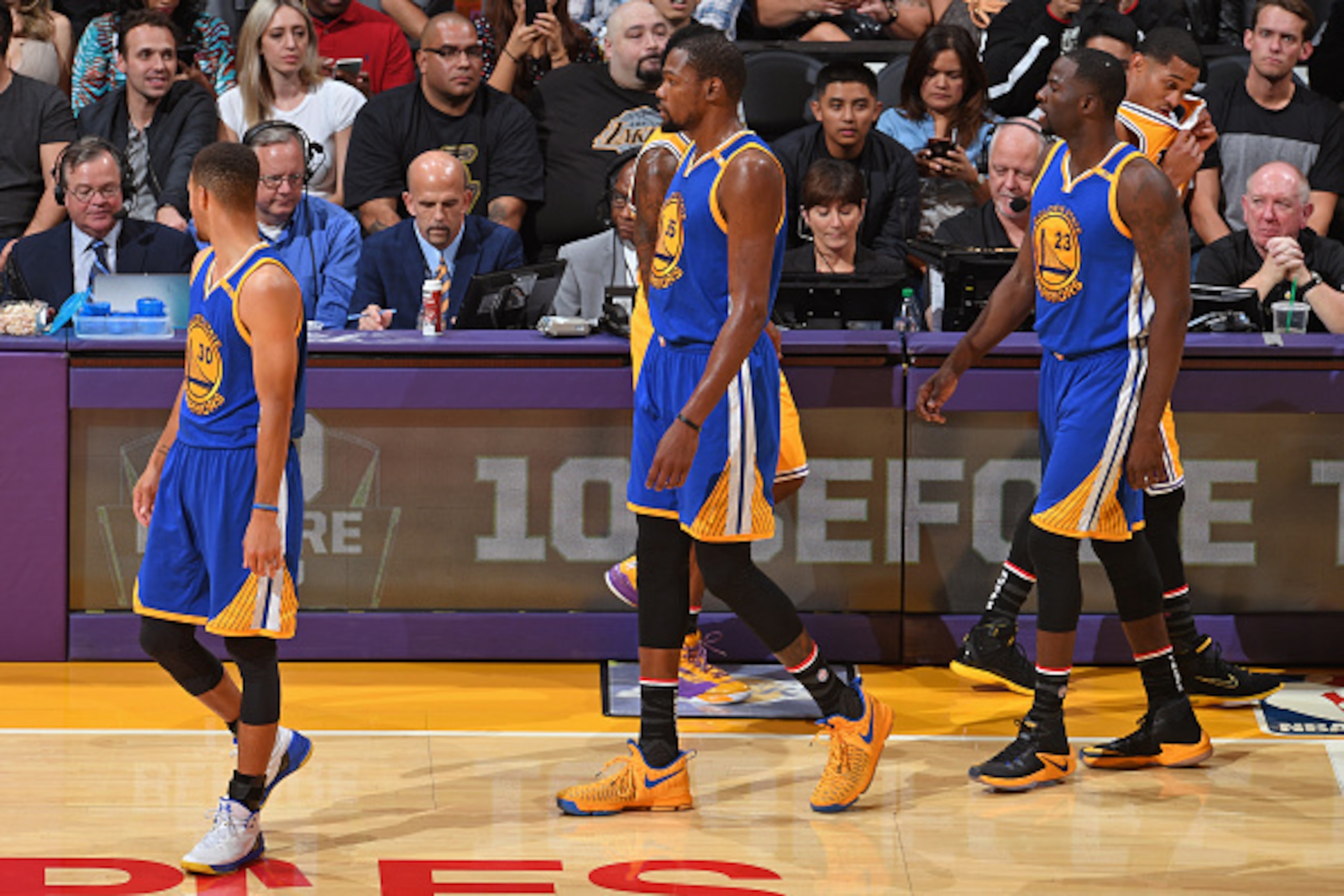 LOS ANGELES, CA - NOVEMBER 4:  Stephen Curry #30, Kevin Durant #35 and Draymond Green #23 of the Golden State Warriors walk on the court during the game against the Los Angeles Lakers on November 4, 2016 at STAPLES Center in Los Angeles, California. NOTE 