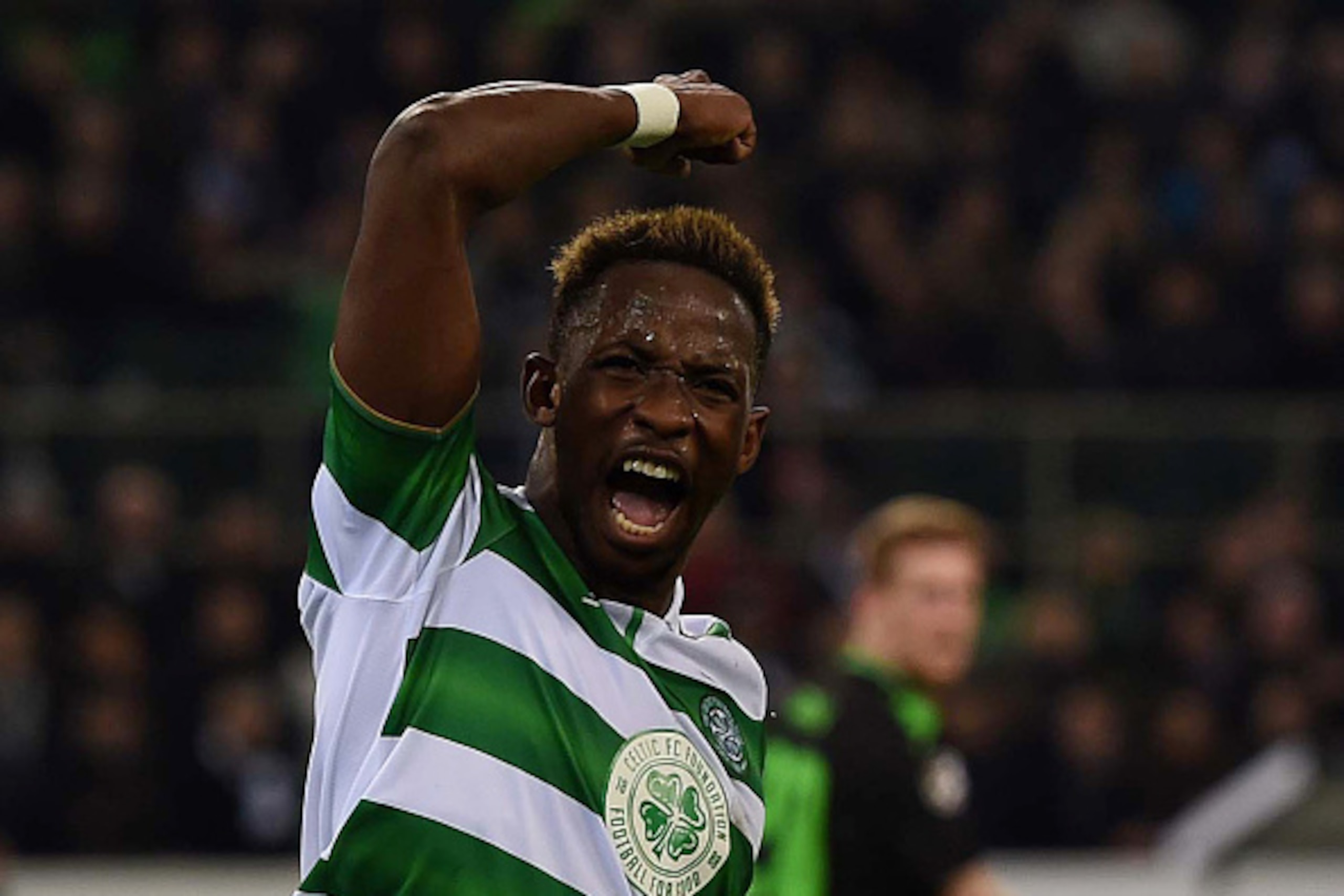 Celtic's French striker Moussa Dembele celebrates scoring the equalizer from the penalty spot during the UEFA Champions league Group C football match between Borussia Moenchengladbach and Celtic in Moenchengladbach, western Germany on November 1, 2016. / 