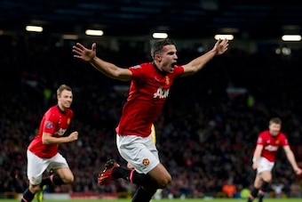 Van Persie celebrates a goal against his old club.