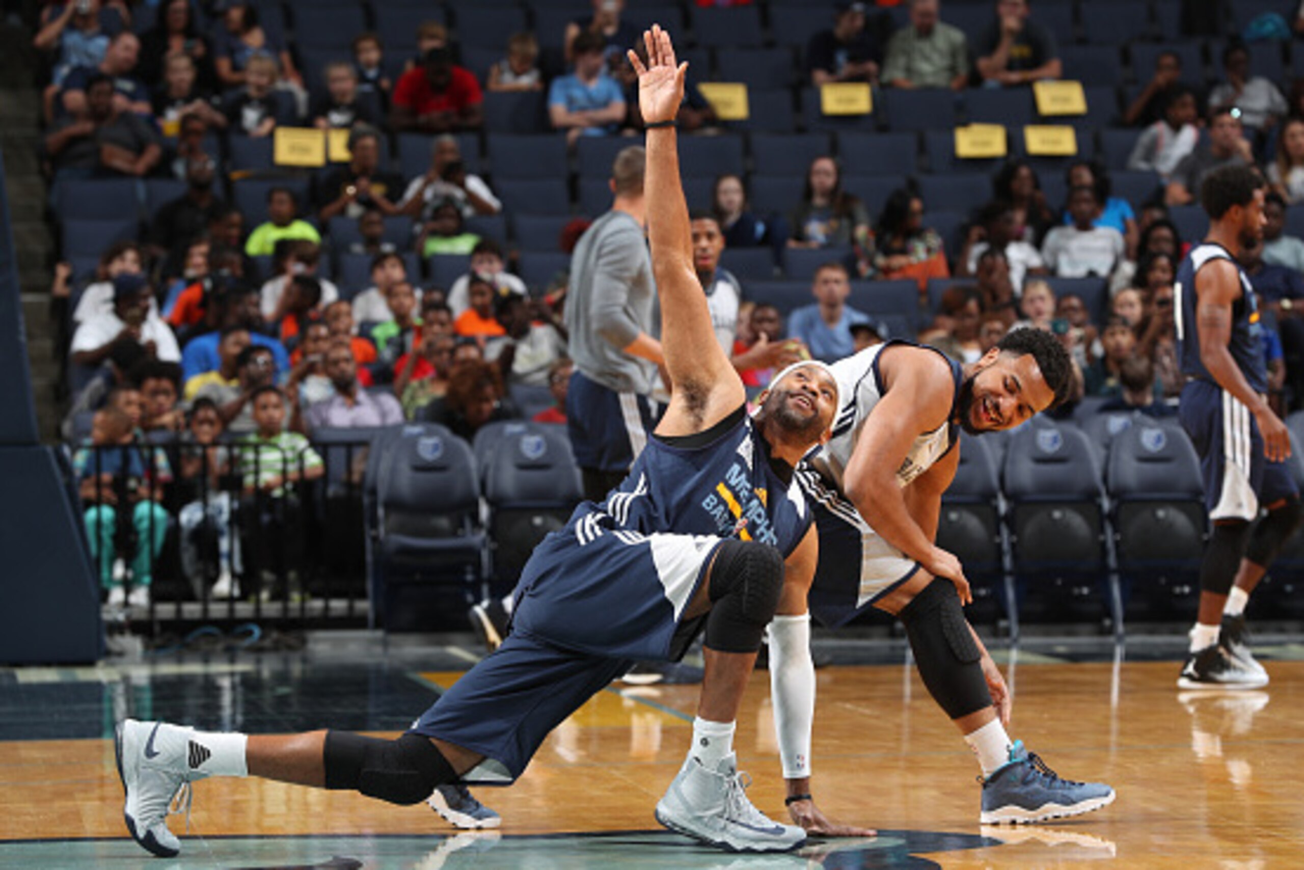 MEMPHIS, TN - OCTOBER 1: Chris Crawford #6 and Vince Carter #15 of the Memphis Grizzlies stretch during an open practice on October 1, 2016 at FedExForum in Memphis, Tennessee. NOTE TO USER: User expressly acknowledges and agrees that, by downloading an MEMPHIS, TN - OCTOBER 1: Chris Crawford #6 and Vince Carter #15 of the Memphis Grizzlies stretch during an open practice on October 1, 2016 at FedExForum in Memphis, Tennessee. NOTE TO USER: User expressly acknowledges and agrees that, by downloading an