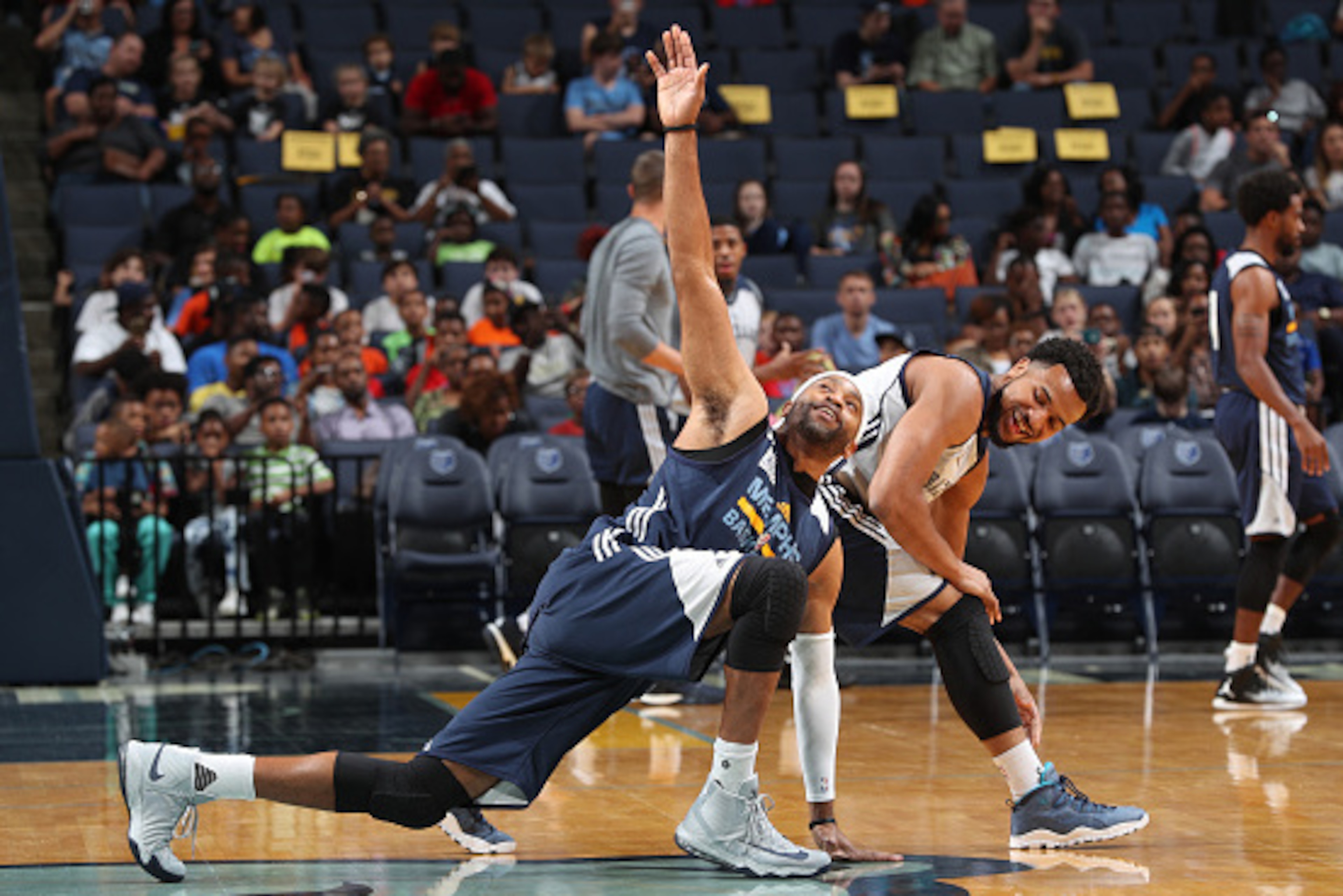 MEMPHIS, TN - OCTOBER 1:  Chris Crawford #6 and Vince Carter #15 of the Memphis Grizzlies stretch during an open practice on October 1, 2016 at FedExForum in Memphis, Tennessee.  NOTE TO USER: User expressly acknowledges and agrees that, by downloading an