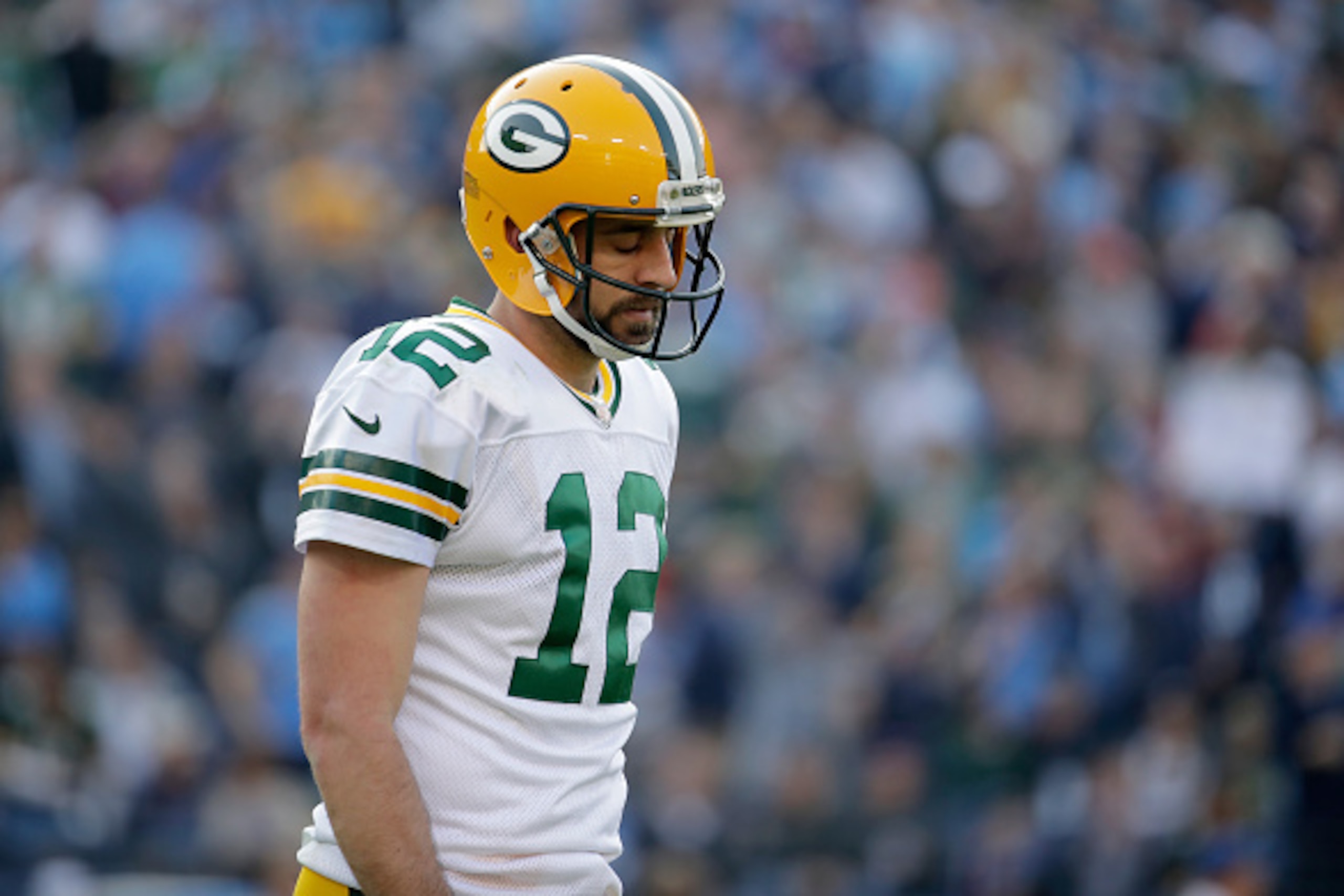 NASHVILLE, TN - NOVEMBER 13: Aaron Rodgers #12 of the Green Bay Packers walks off of the field with his head down after throwing an interception during the game against the Tennessee Titans at Nissan Stadium on November 13, 2016 in Nashville, Tennessee. NASHVILLE, TN - NOVEMBER 13: Aaron Rodgers #12 of the Green Bay Packers walks off of the field with his head down after throwing an interception during the game against the Tennessee Titans at Nissan Stadium on November 13, 2016 in Nashville, Tennessee.