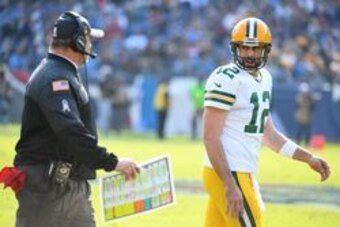 Nov 13, 2016; Nashville, TN, USA; Green Bay Packers head coach Mike McCarthy talks with quarterback Aaron Rodgers (12) during the first half against the Tennessee Titans at Nissan Stadium. Mandatory Credit: Christopher Hanewinckel-USA TODAY Sports