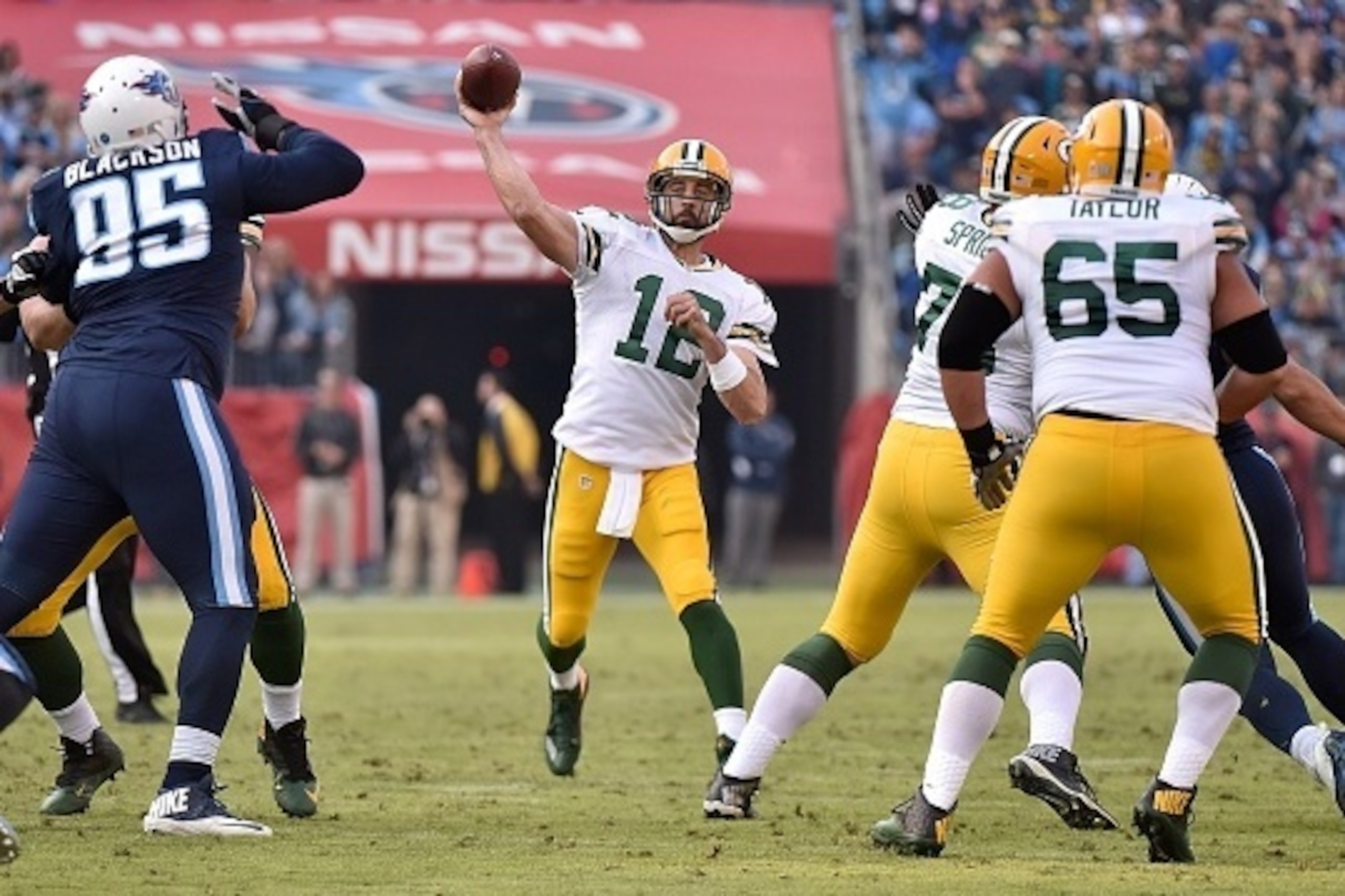 NASHVILLE, TN - NOVEMBER 13: Quarterback Aaron Rodgers #12 of the Green Bay Packers throws a pass past Angelo Blackson #95 of the Tennessee Titans during the second half at Nissan Stadium on November 13, 2016 in Nashville, Tennessee. (Photo by Frederick NASHVILLE, TN - NOVEMBER 13: Quarterback Aaron Rodgers #12 of the Green Bay Packers throws a pass past Angelo Blackson #95 of the Tennessee Titans during the second half at Nissan Stadium on November 13, 2016 in Nashville, Tennessee. (Photo by Frederick