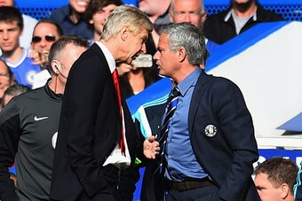 LONDON, ENGLAND - OCTOBER 05:  Managers Arsene Wenger of Arsenal and Jose Mourinho manager of Chelsea clash during the Barclays Premier League match between Chelsea and Arsenal at Stamford Bridge on October 4, 2014 in London, England.  (Photo by Shaun Bot