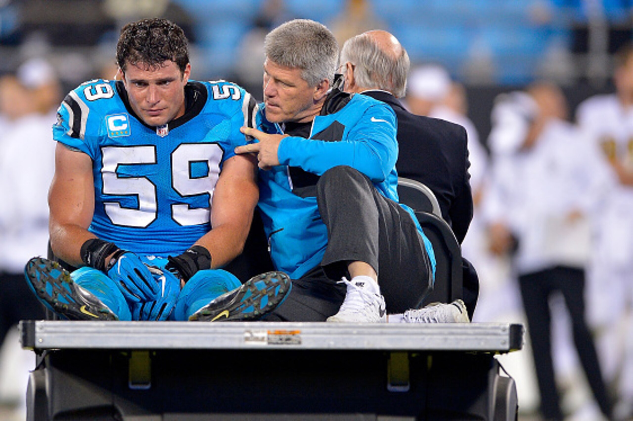 CHARLOTTE, NC - NOVEMBER 17:  Luke Kuechly #59 of the Carolina Panthers is carried off the field after an injury against the New Orleans Saints in the fourth quarter during the game at Bank of America Stadium on November 17, 2016 in Charlotte, North Carol