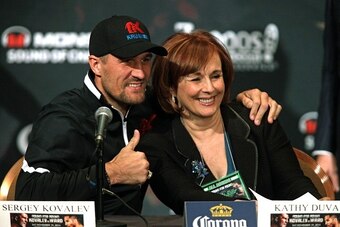 Boxer Sergey Kovalev (L) of Russia poses with Kathy Duva, CEO Main Events at a news conference at the MGM Grand in Las Vegas, November 17, 2016.  
Kovalev will meet Andre Ward of the US for the  WBA, IBF and WBO light heavyweight world championship, Novem