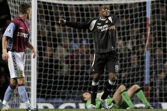 BIRMINGHAM, UNITED KINGDOM - NOVEMBER 29:  Manchester City goalscorer Sylvain Distin celebrates after scoring the third City goal during the Barclays Premiership match between Aston villa and Manchester City at Villa Park on November 29, 2006 in Birmingha