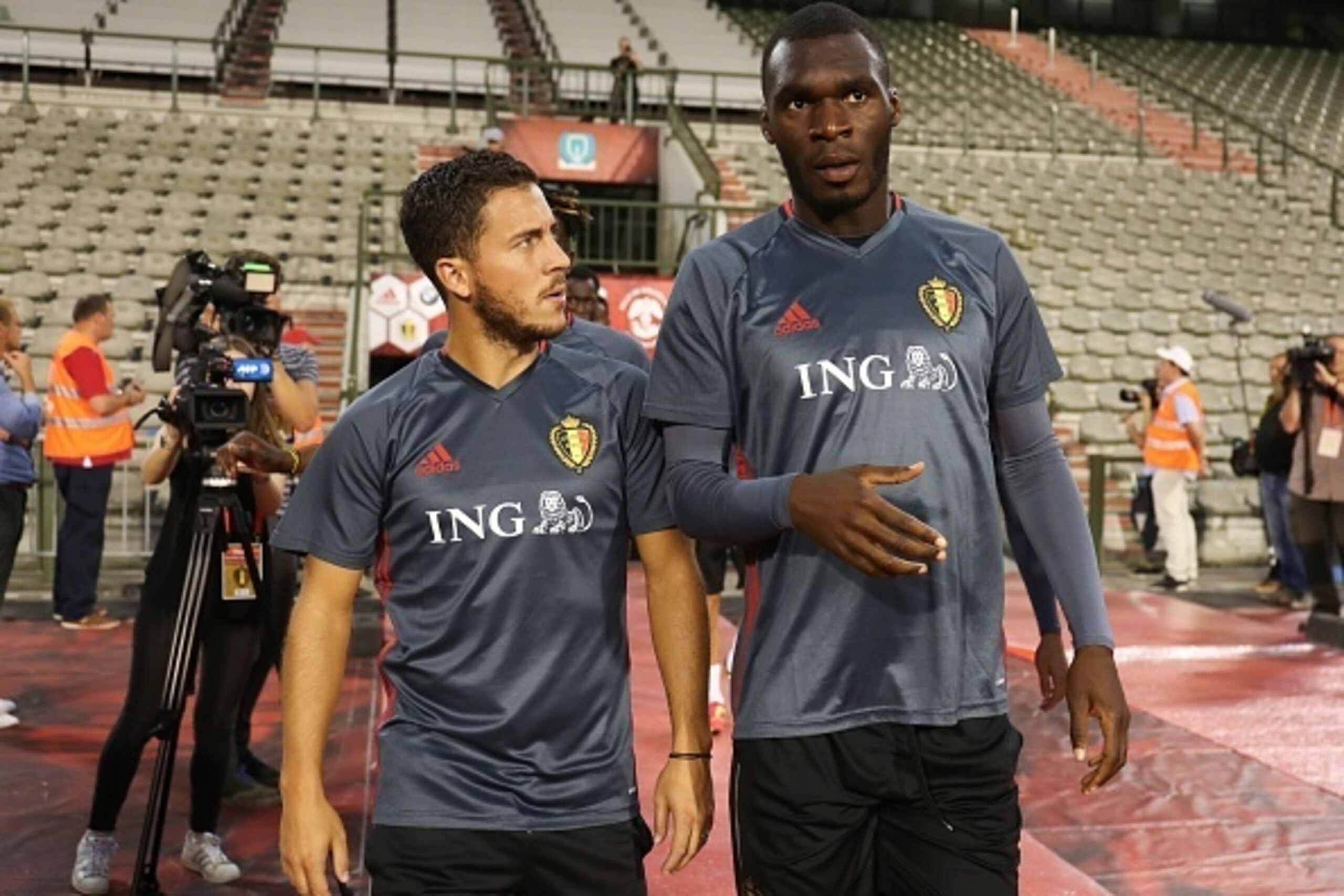 Belgium's Eden Hazard (L) and Christian Benteke arrive for a training session of the Belgium's national football team Red Devils, on August 31, 2016, in Brussels, ahead of a friendly football match against Spain on September 1 and a 2018 World Championshi