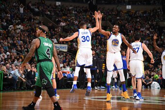 BOSTON, MA - NOVEMBER 18:  Stephen Curry #30 and Kevin Durant #35 of the Golden State Warriors celebrate during a game against the Boston Celtics on November 18, 2016 at TD Garden in Boston, Massachusetts. NOTE TO USER: User expressly acknowledges and agr