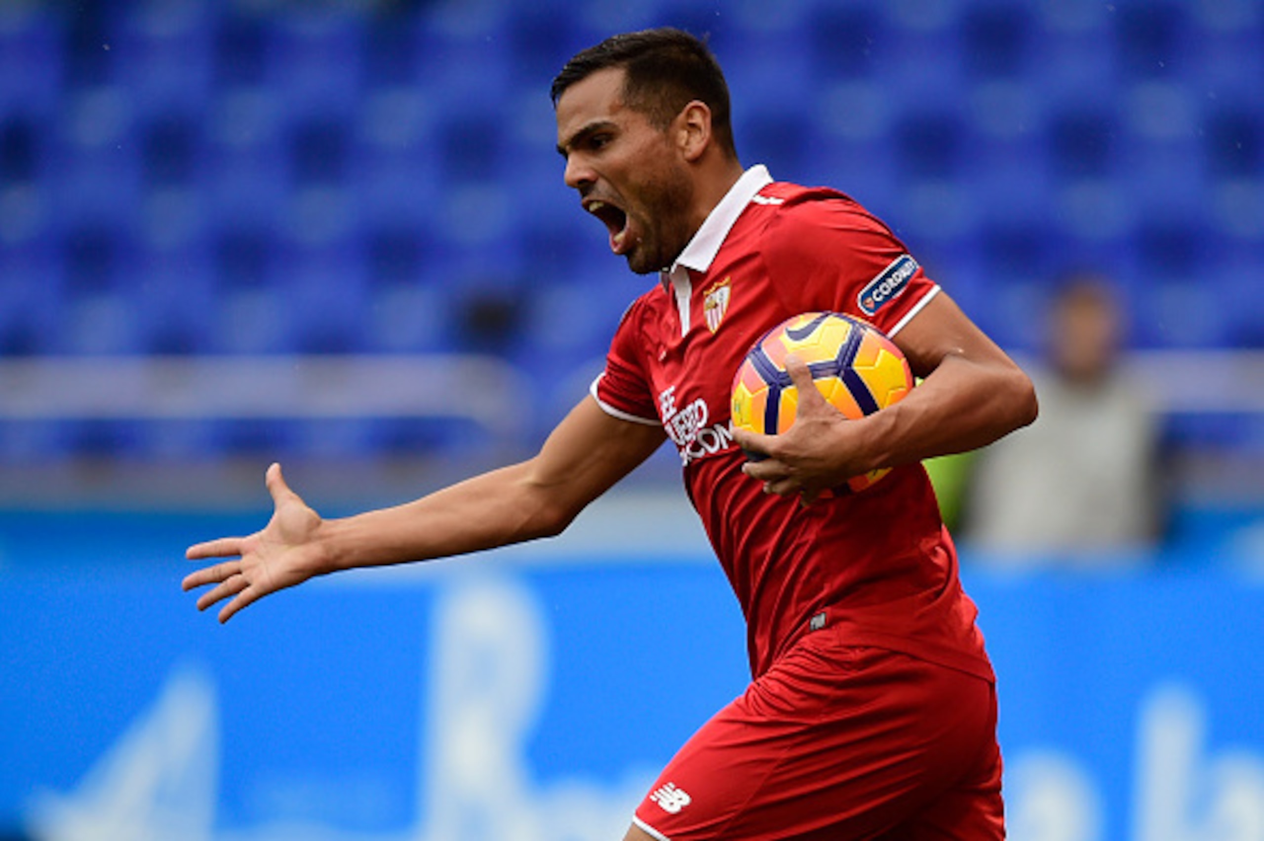 Sevilla's Argentinian defender Gabriel Mercado celebrates his teammate forward Vitolo's goal during the Spanish league football match between RC Deportivo de la Coruna and Sevilla FC at the Municipal de Riazor stadium in La Coruna, on November 19, 2016. / Sevilla's Argentinian defender Gabriel Mercado celebrates his teammate forward Vitolo's goal during the Spanish league football match between RC Deportivo de la Coruna and Sevilla FC at the Municipal de Riazor stadium in La Coruna, on November 19, 2016. /