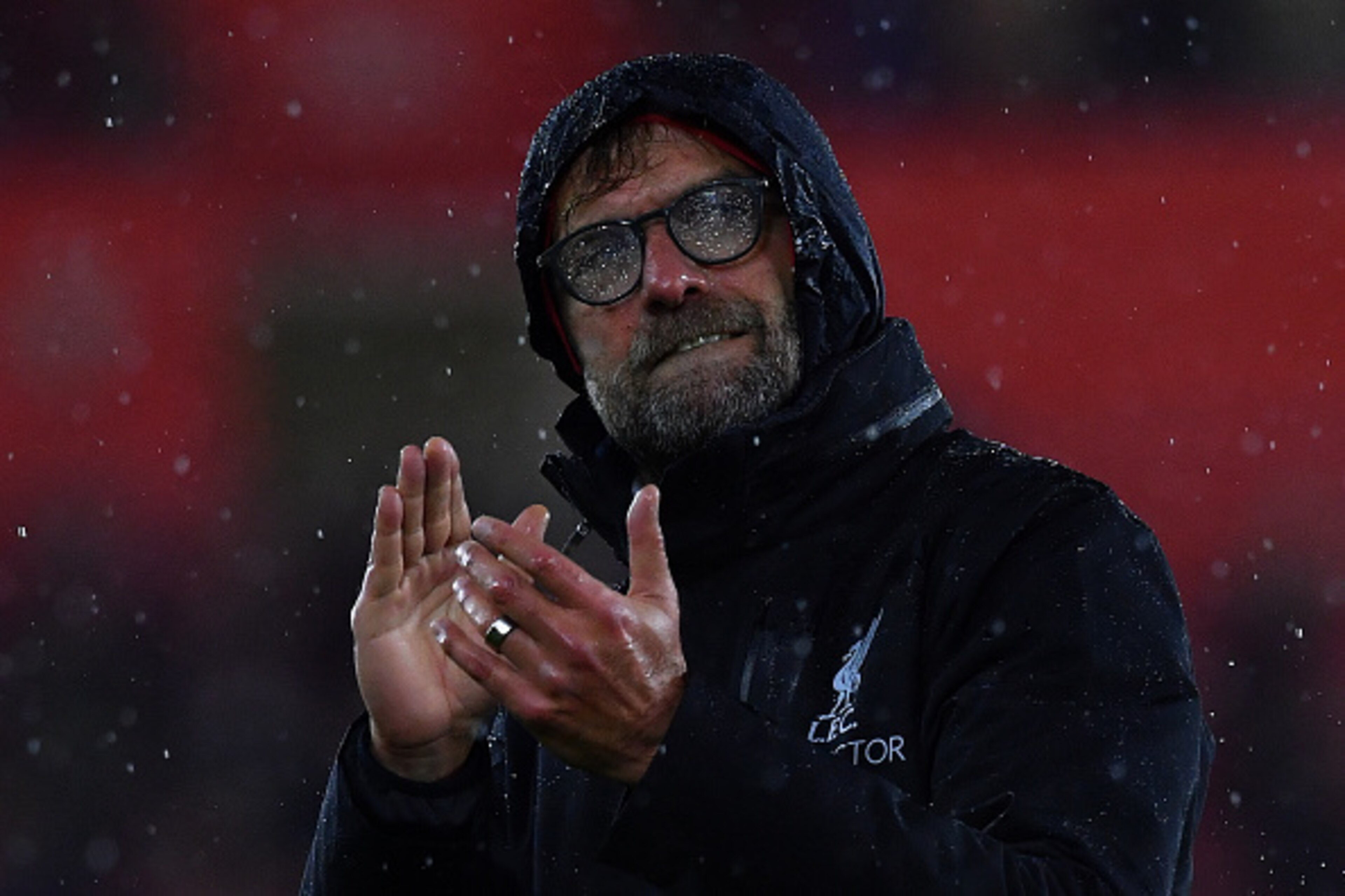Rain covers the glasses of Liverpool's German manager Jurgen Klopp as he applauds the fans following the English Premier League football match between Southampton and Liverpool at St Mary's Stadium in Southampton, southern England on November 19, 2016.
Th