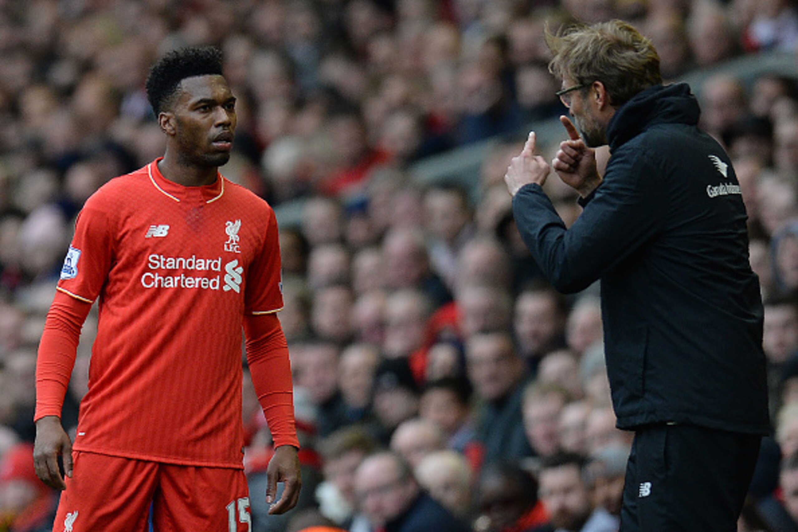 Liverpool's German manager Jurgen Klopp (R) gives instructions to Liverpool's English striker Daniel Sturridge during the English Premier League football match between Liverpool and Stoke City at Anfield in Liverpool, northwest England on April 10, 2016. 
