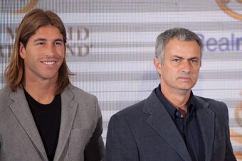 MADRID, SPAIN - MARCH 22:  (L-R) Real Madrid player Sergio Ramos and coach Jose Mourinho attend the Real Madrid Resort Island presentation at Estadio Santiago Bernabeu on March 22, 2012 in Madrid, Spain.  (Photo by Pablo Blazquez Dominguez/Getty Images)