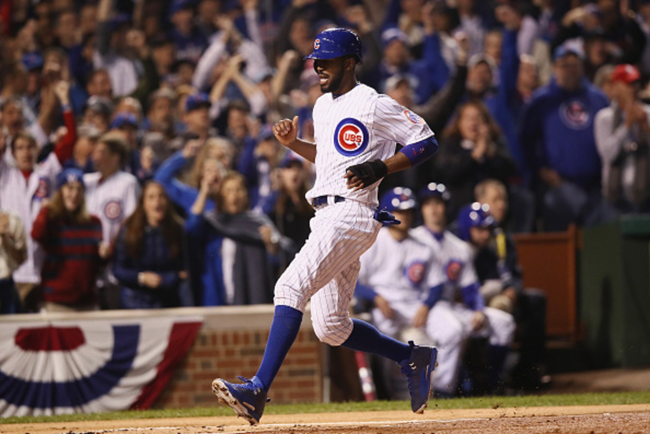 CHICAGO, IL - OCTOBER 29:  Dexter Fowler #24 of the Chicago Cubs scores a run in the first inning against the Cleveland Indians in Game Four of the 2016 World Series at Wrigley Field on October 29, 2016 in Chicago, Illinois.  (Photo by Ezra Shaw/Getty Ima