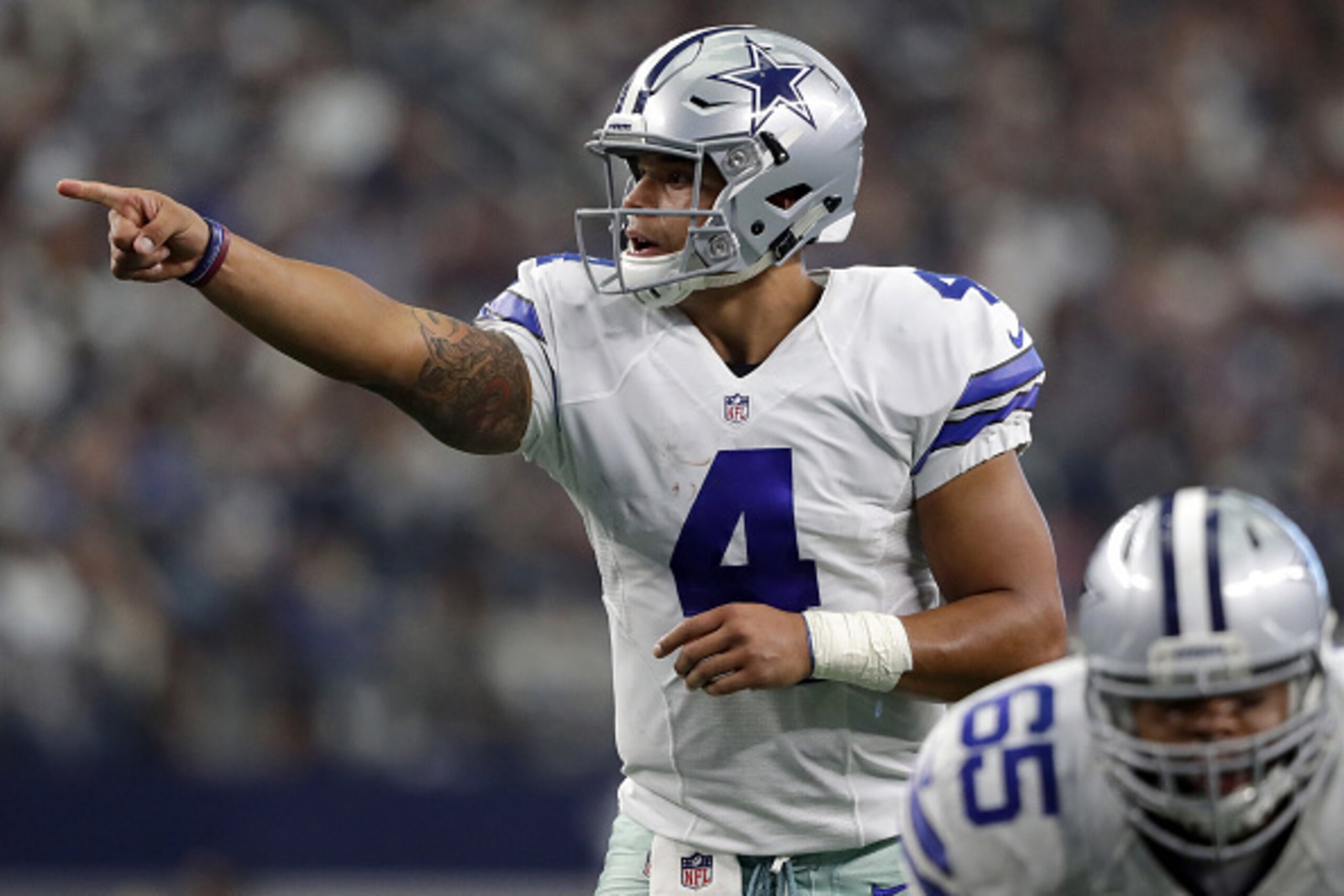 ARLINGTON, TX - NOVEMBER 20: Dak Prescott #4 of the Dallas Cowboys calls a play at the line of scrimmage during the second half against the Baltimore Ravens at AT&T Stadium on November 20, 2016 in Arlington, Texas. (Photo by Ronald Martinez/Getty Image ARLINGTON, TX - NOVEMBER 20: Dak Prescott #4 of the Dallas Cowboys calls a play at the line of scrimmage during the second half against the Baltimore Ravens at AT&T Stadium on November 20, 2016 in Arlington, Texas. (Photo by Ronald Martinez/Getty Image