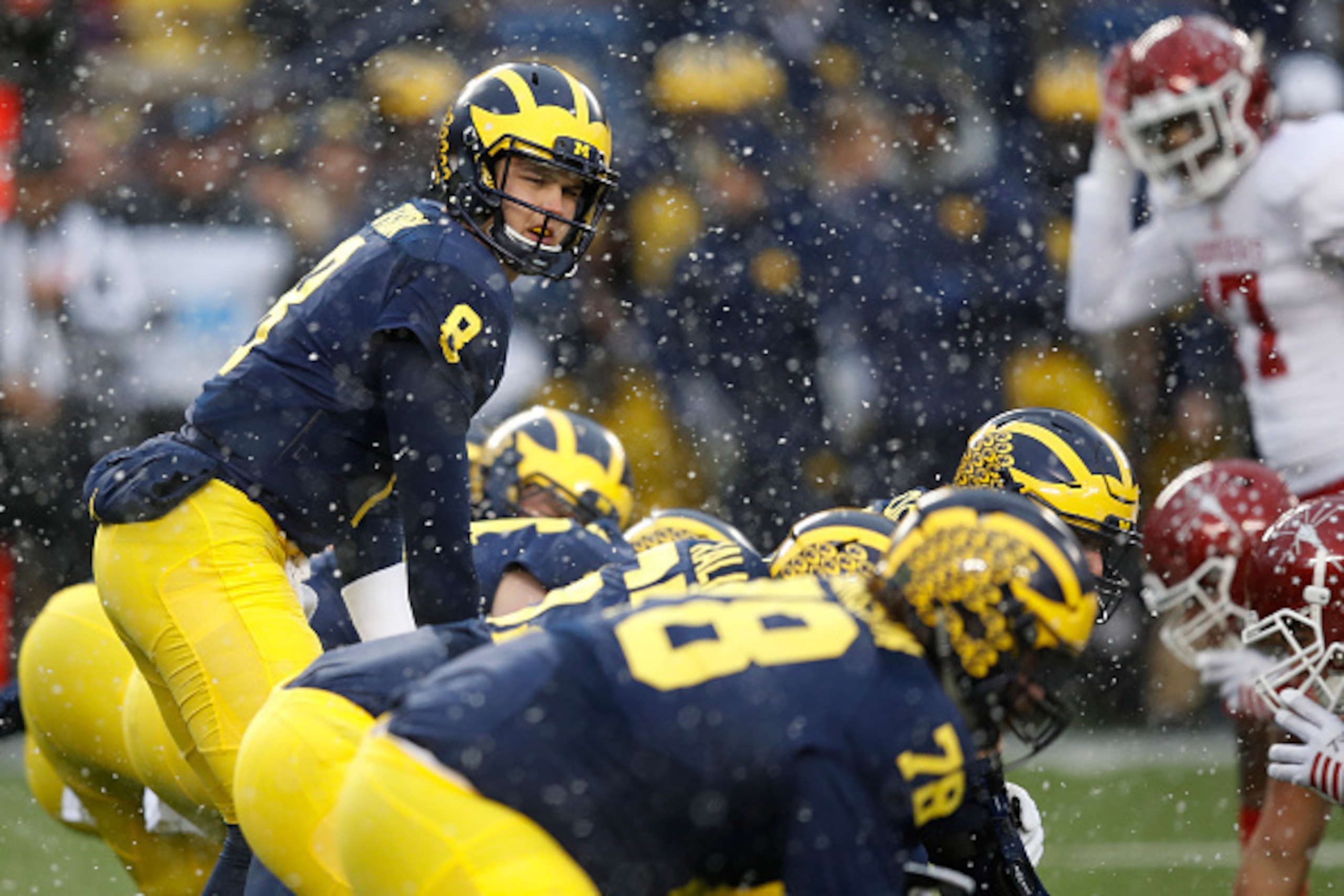 ANN ARBOR, MI - NOVEMBER 19: John O'Korn #8 of the Michigan Wolverines gets ready for a snap while playing the Indiana Hoosiers on November 19, 2016 at Michigan Stadium in Ann Arbor, Michigan. Michigan won the game 20-10. (Photo by Gregory Shamus/Getty Im