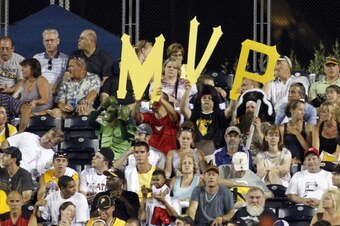 PITTSBURGH, PA - JULY 6:  Pirates fans hold up MVP letters to support Andrew McCutchen #22 of the Pittsburgh Pirates during the game against San Francisco Giants on July 6, 2012 at PNC Park in Pittsburgh, Pennsylvania.  The Giants defeated the Pirates 6-5