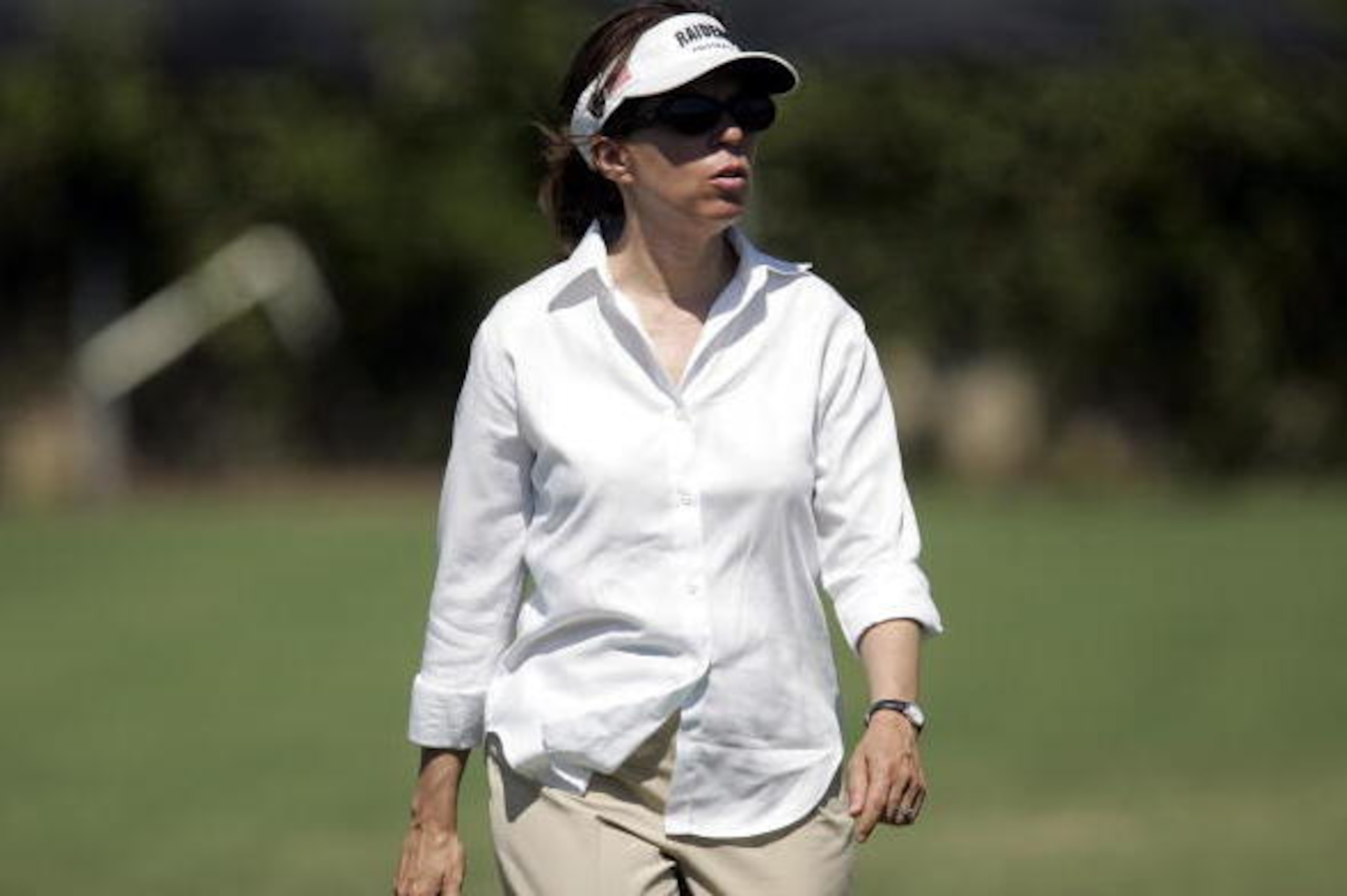 NAPA, CA - JULY 25:  Amy Trask, Chief Executive of the Oakland Raiders and the only female CEO in the NFL watches as the Oakland Raiders start their camp at the Marriott Hotel on July 25, 2006 in Napa, California.  (Photo by David Paul Morris/Getty Images