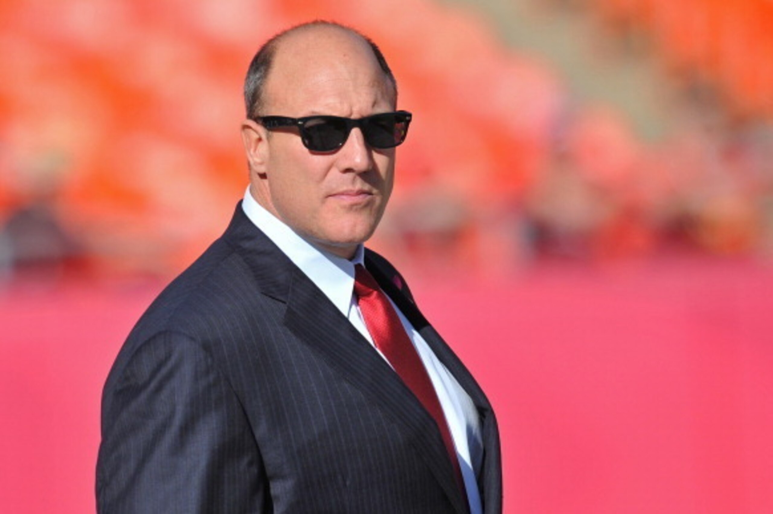 KANSAS CITY, MO - DECEMBER 02:  General Manager Scott Pioli of the Kansas City Chiefs on the field before a game against the Carolina Panthers on December 2, 2012 at Arrowhead Stadium in Kansas City, Missouri.  (Photo by Peter G. Aiken/Getty Images)