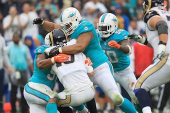 LOS ANGELES, CA - NOVEMBER 20:  Quarterback Jared Goff #16 of the Los Angeles Rams is sacked by Andre Branch #50 and Ndamukong Suh #93 during the second quarter of the game against the Miami Dolphins at Los Angeles Coliseum on November 20, 2016 in Los Ang