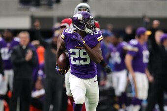 MINNEAPOLIS, MN - NOVEMBER 20: Xavier Rhodes #29 of the Minnesota Vikings carries the ball for a touchdown after intercepting a pass in the second quarter of the game on November 20, 2016 at US Bank Stadium in Minneapolis, Minnesota. (Photo by Adam Bettch