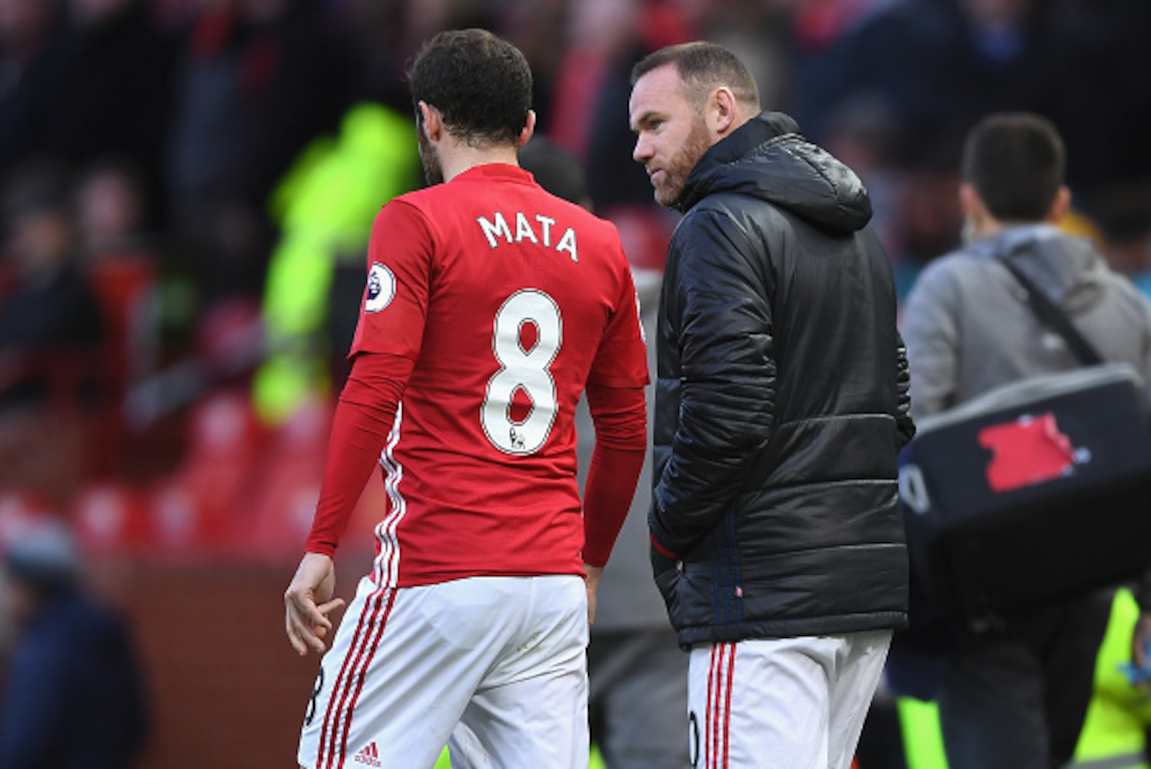 MANCHESTER, ENGLAND - NOVEMBER 19: Juan Mata of Manchester United (L) speaks to Wayne Rooney of Manchester United (R) during the Premier League match between Manchester United and Arsenal at Old Trafford on November 19, 2016 in Manchester, England. (Pho MANCHESTER, ENGLAND - NOVEMBER 19: Juan Mata of Manchester United (L) speaks to Wayne Rooney of Manchester United (R) during the Premier League match between Manchester United and Arsenal at Old Trafford on November 19, 2016 in Manchester, England. (Pho