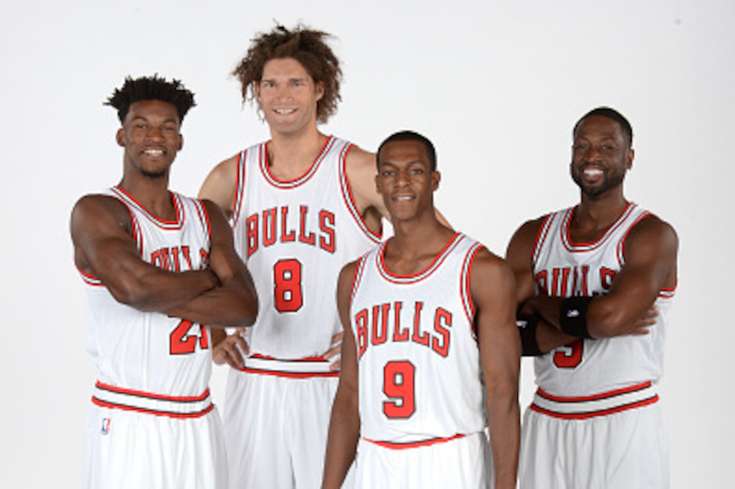 CHICAGO, IL - SEPTEMBER 26:  Jimmy Butler #21, Robin Lopez, Rajon Rondo #9 and Dwyane Wade #3 of the Chicago Bulls poses for a portrait during the 2016-2017 Chicago Bulls Media Day on September 26, 2016 at the Advocate Center in Chicago, Illinois. NOTE TO