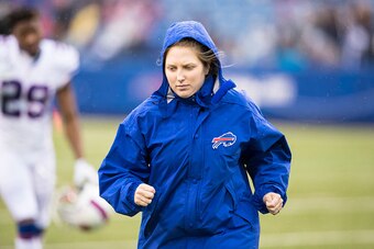 ORCHARD PARK, NY - OCTOBER 30:  Kathryn Smith Buffalo Bills Quality Control-Special Teams exits the field after warm ups before the game against the New England Patriots on October 30, 2016 at New Era Field in Orchard Park, New York. New England defeats B
