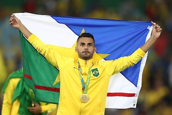 RIO DE JANEIRO, BRAZIL - AUGUST 20:  Thiago Maia of Brazil celebrates after the Men's Football Final between Brazil and Germany at the Maracana Stadium on Day 15 of the Rio 2016 Olympic Games on August 20, 2016 in Rio de Janeiro, Brazil.  (Photo by Clive 