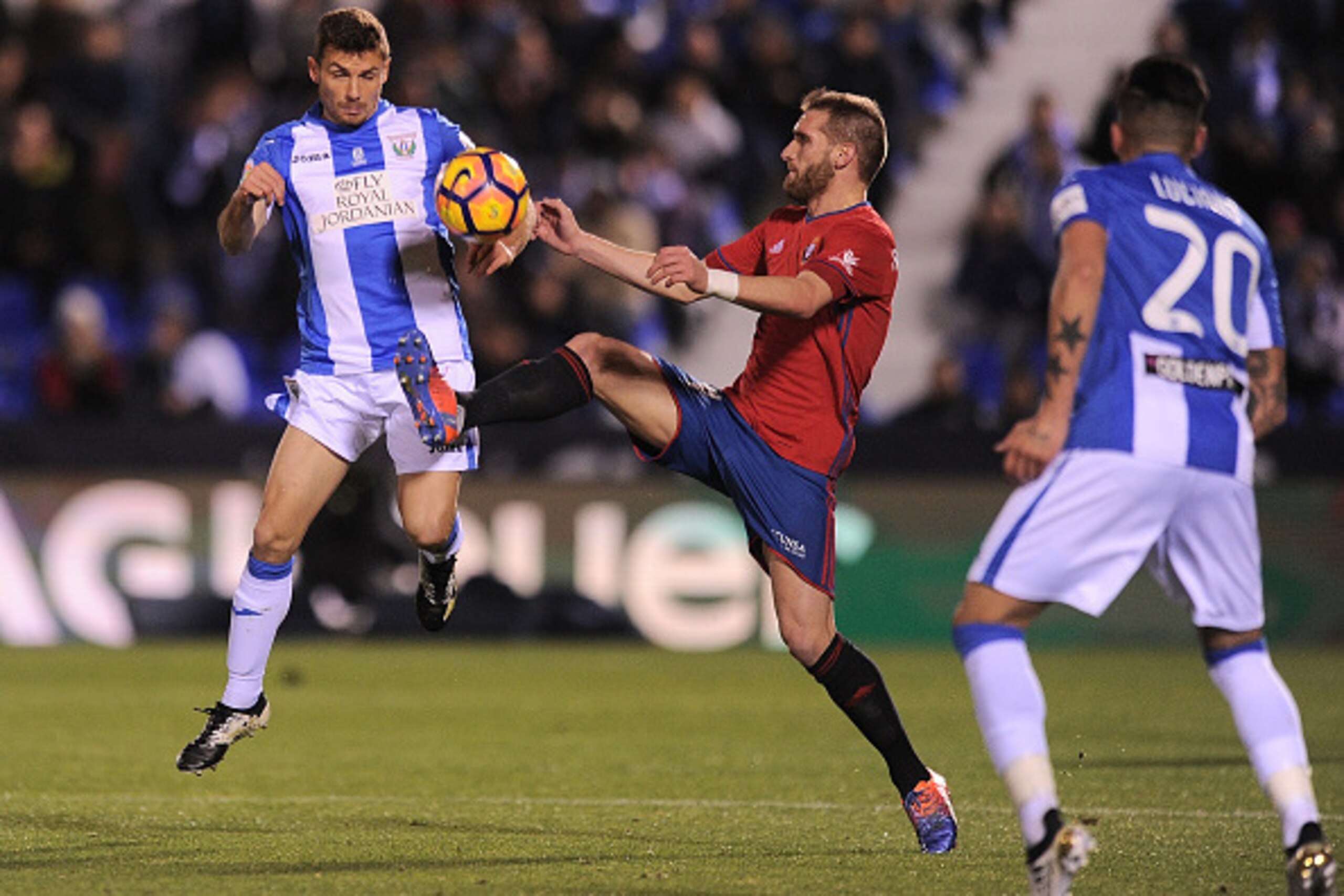 LEGANES, SPAIN - NOVEMBER 21:  Fausto Tienza of CA Osasuna cuts off  Alberti Martin of CD Leganes during the La Liga match between CD Leganes and CA Osasuna at Estadio Municipal de Butarque on November 21, 2016 in Leganes, Spain.  (Photo by Denis Doyle/Ge