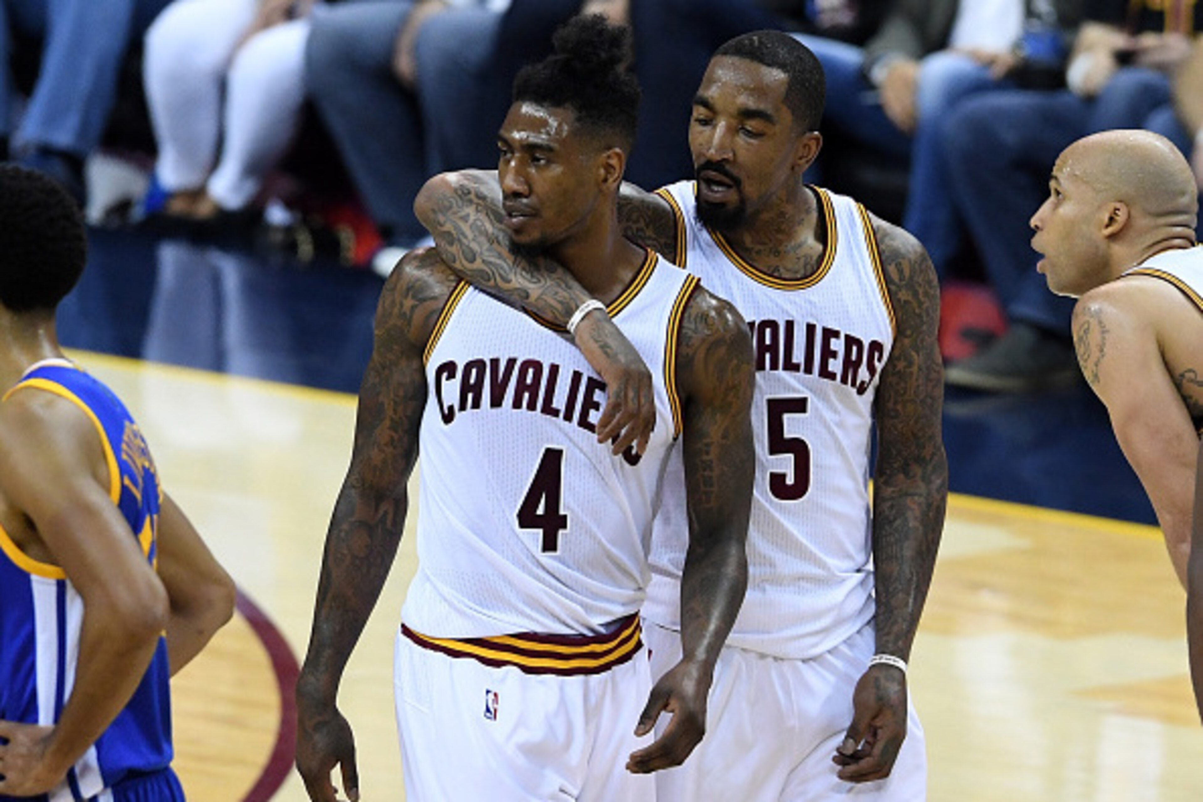 CLEVELAND, OH - JUNE 16: Iman Shumpert #4 and J.R. Smith #5 of the Cleveland Cavaliers react after a play in the first half against the Golden State Warriors in Game 6 of the 2016 NBA Finals at Quicken Loans Arena on June 16, 2016 in Cleveland, Ohio. NOTE