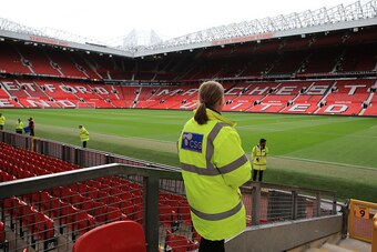 MANCHESTER, ENGLAND - MAY 17: Security staff on duty inside Old Trafford Stadium before the Barclays Premier League match between Manchester United and AFC Bournemouth at Old Trafford on May 17, 2016 in Manchester, England. (Photo by James Baylis - AMA/Ge