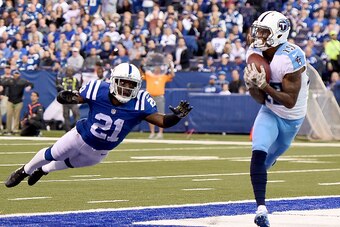 INDIANAPOLIS, IN - NOVEMBER 20:  Tajae Sharpe #19 of the Tennessee Titans breaks free from Vontae Davis #21 of the Indianapolis Colts as he catches a touchdown pass during the third quarter of the game at Lucas Oil Stadium on November 20, 2016 in Indianap
