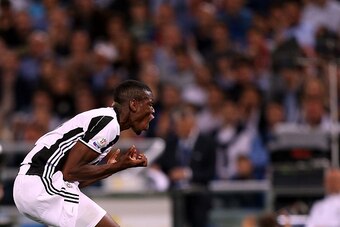 ROME, ITALY - MAY 21: Paul Pogba of Juventus FC reacts during the TIM Cup match between AC Milan and Juventus FC at Stadio Olimpico on May 21, 2016 in Rome, Italy.  (Photo by Gabriele Maltinti/Getty Images)