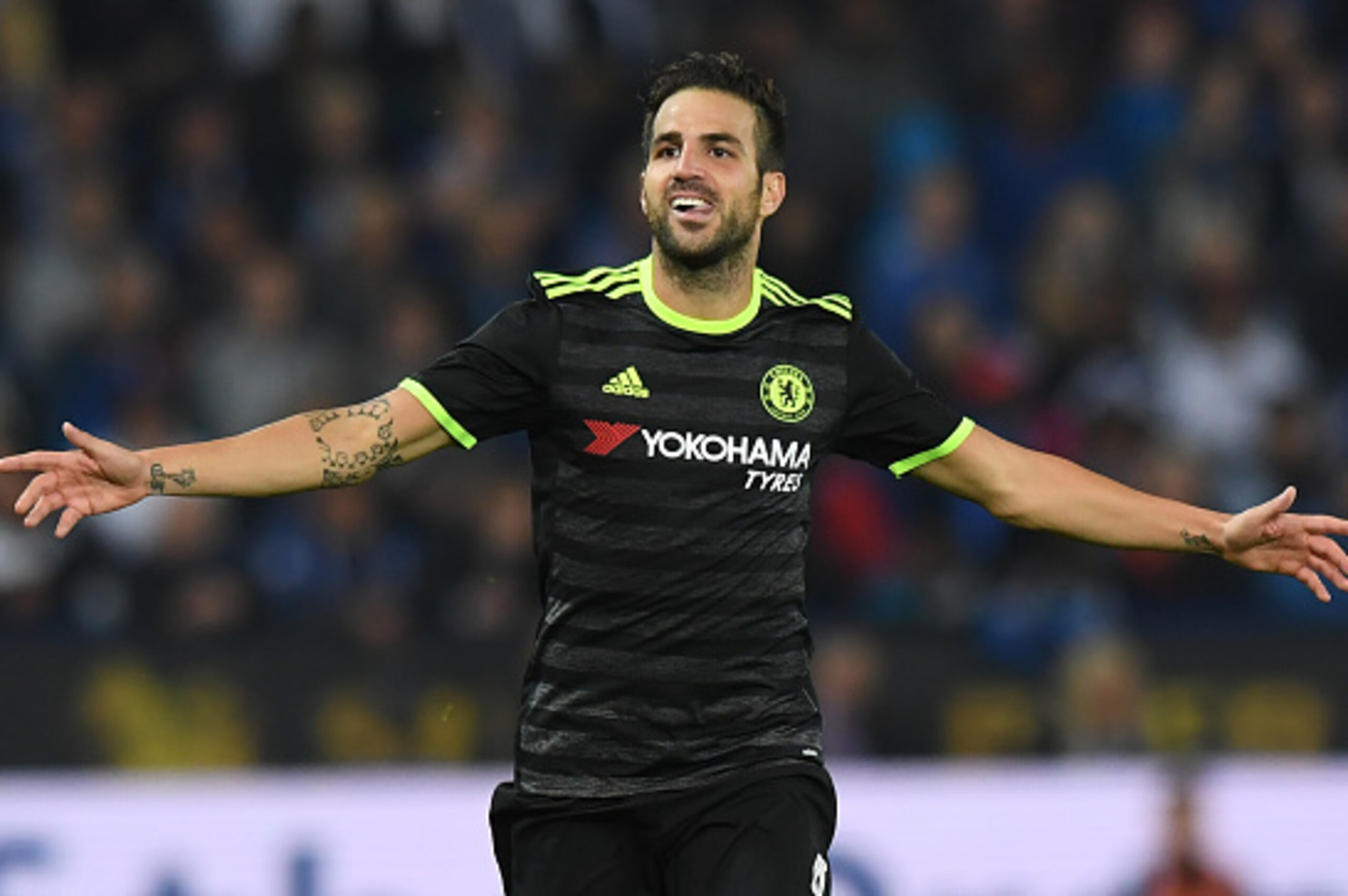 Chelsea's Spanish midfielder Cesc Fabregas celebrates scoring their fourth goal during extra-time in the English League Cup third round football match between Leicester City and Chelsea at King Power Stadium in Leicester, central England on September 20, 