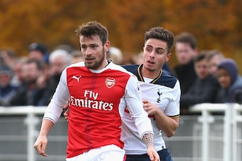 ENFIELD, ENGLAND - NOVEMBER 18:  Anthony Georgiou of Tottenham Hotspur closes down Mathieu Debuchy of Arsenal during the Premier League 2 match between Tottenham Hotspur and Arsenal at at Tottenham Hotspur Training Centre on November 18, 2016 in Enfield, 