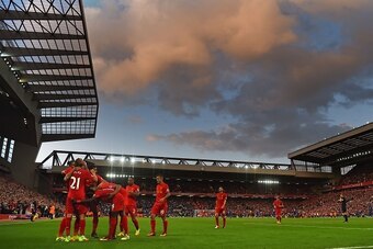 Liverpool's players celebrate together after Firmino scores their fourth goal during the English Premier League football match between Liverpool and Leicester City at Anfield in Liverpool, north west England on September 10, 2016.
Liverpool won the game 4