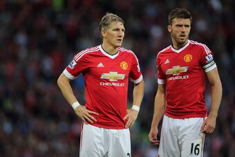 MANCHESTER, ENGLAND - SEPTEMBER 12:  Bastian Schweinsteiger and Michael Carrick of Manchester United during the Barclays Premier League match between Manchester United and Liverpool on September 12, 2015 in Manchester, United Kingdom.  (Photo by Matthew A