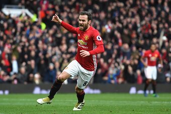 MANCHESTER, ENGLAND - NOVEMBER 19:  Juan Mata of Manchester United (C) celebrates scoring his sides first goal during the Premier League match between Manchester United and Arsenal at Old Trafford on November 19, 2016 in Manchester, England.  (Photo by Sh