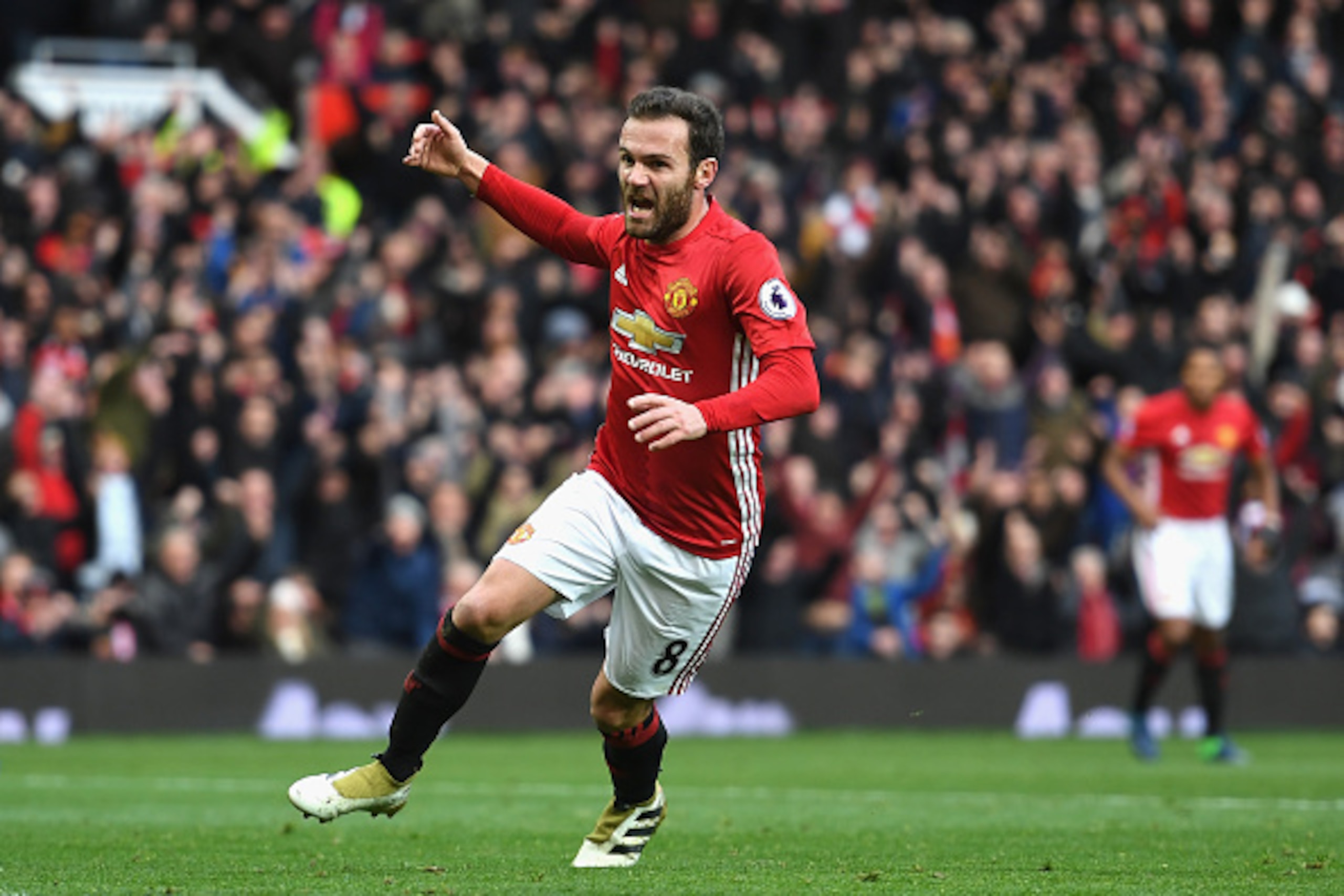 MANCHESTER, ENGLAND - NOVEMBER 19: Juan Mata of Manchester United (C) celebrates scoring his sides first goal during the Premier League match between Manchester United and Arsenal at Old Trafford on November 19, 2016 in Manchester, England. (Photo by Sh MANCHESTER, ENGLAND - NOVEMBER 19: Juan Mata of Manchester United (C) celebrates scoring his sides first goal during the Premier League match between Manchester United and Arsenal at Old Trafford on November 19, 2016 in Manchester, England. (Photo by Sh