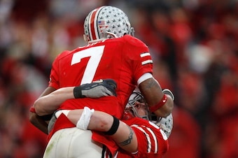 COLUMBUS, OH - NOVEMBER 18:  Ted Ginn Jr. of the Ohio State Buckeyes celebrates his 39-yard touchdown with Rory Nicol #88 in the second quarter against the Michigan Wolverines November 18, 2006 at Ohio Stadium in Columbus, Ohio. The touchdown gave the Buc