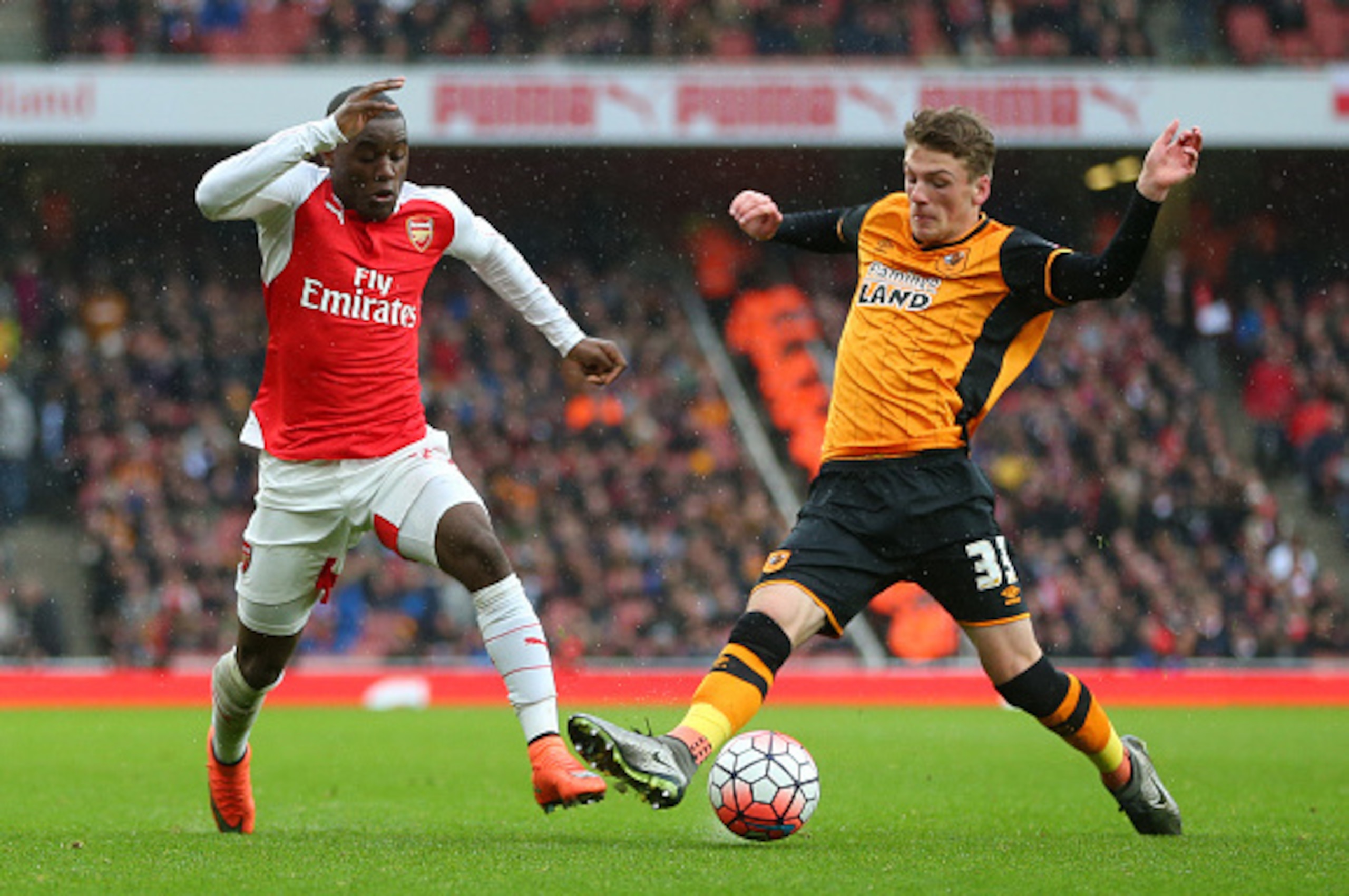 LONDON, ENGLAND - FEBRUARY 20 :  Joel Campbell of Arsenal and Josh Tymon of Hull City during the Emirates FA Cup match between Arsenal and Hull City at the Emirates Stadium on February 20, 2016 in London, England.  (Photo by Catherine Ivill - AMA/Getty Im