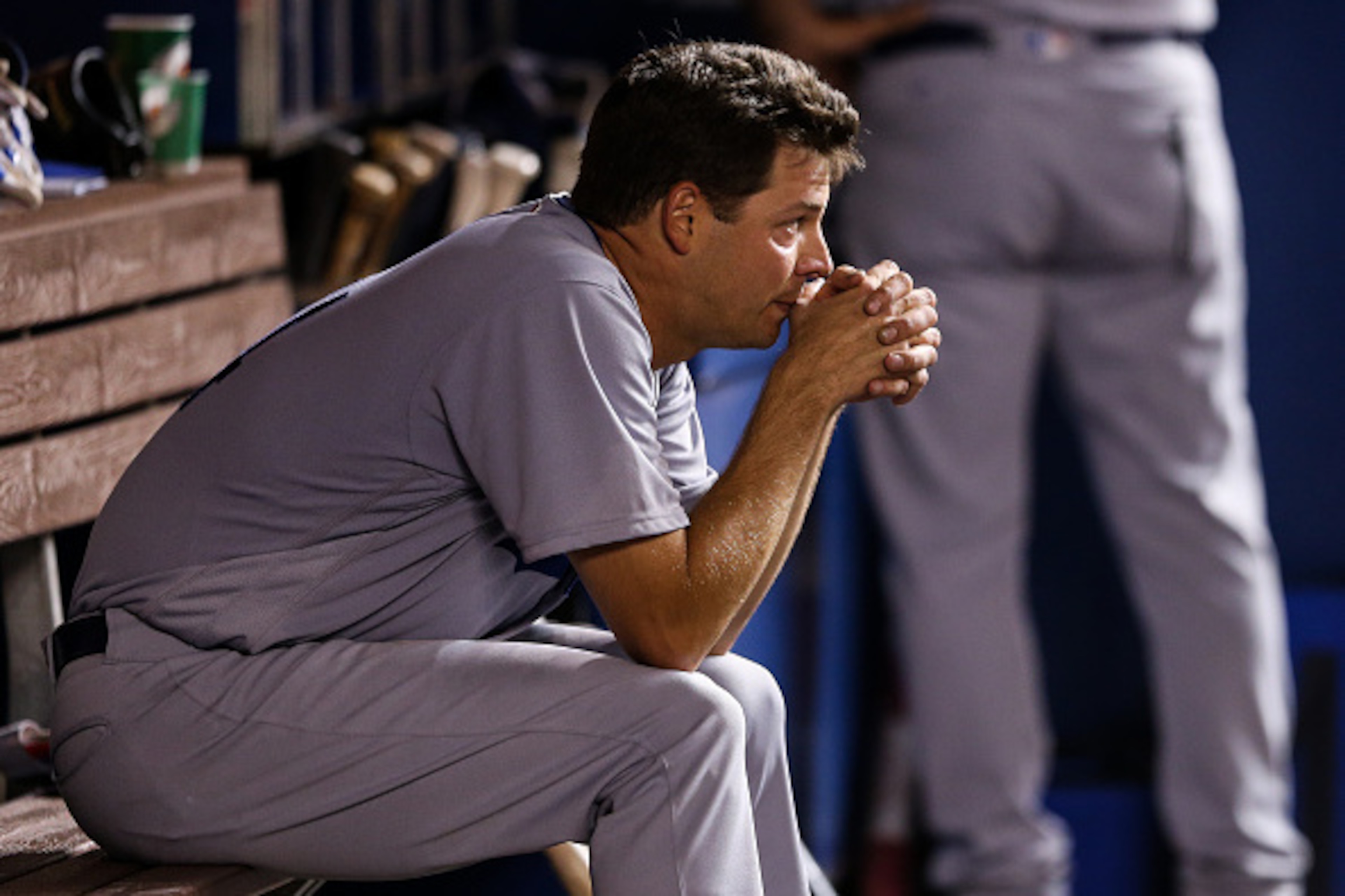 MIAMI, FL - SEPTEMBER 10: Rich Hill #44 of the Los Angeles Dodgers looks on from the dugout after being pulled during the eighth inning despite pitching seven perfect innings during the game against the Miami Marlins at Marlins Park on September 10, 2016 