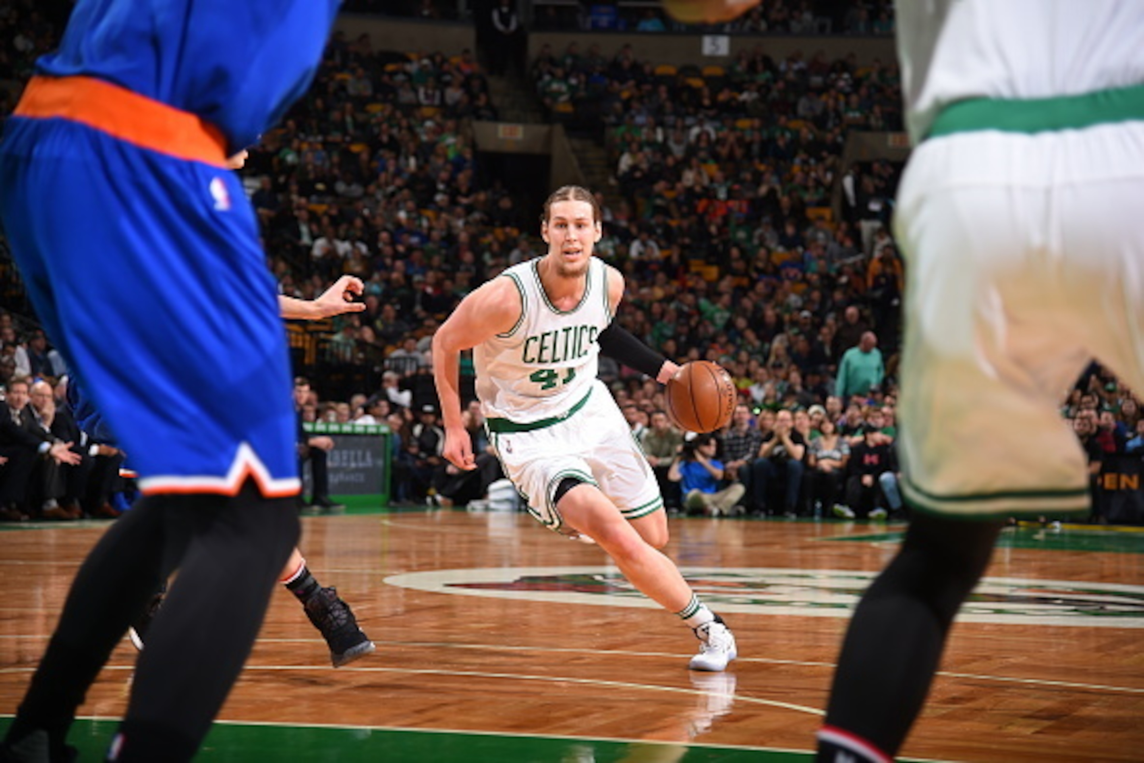 BOSTON, MA - NOVEMBER 11:  Kelly Olynyk #41 of the Boston Celtics drives to the basket against the New York Knicks on November 11, 2016 at the TD Garden in Boston, Massachusetts.  NOTE TO USER: User expressly acknowledges and agrees that, by downloading a