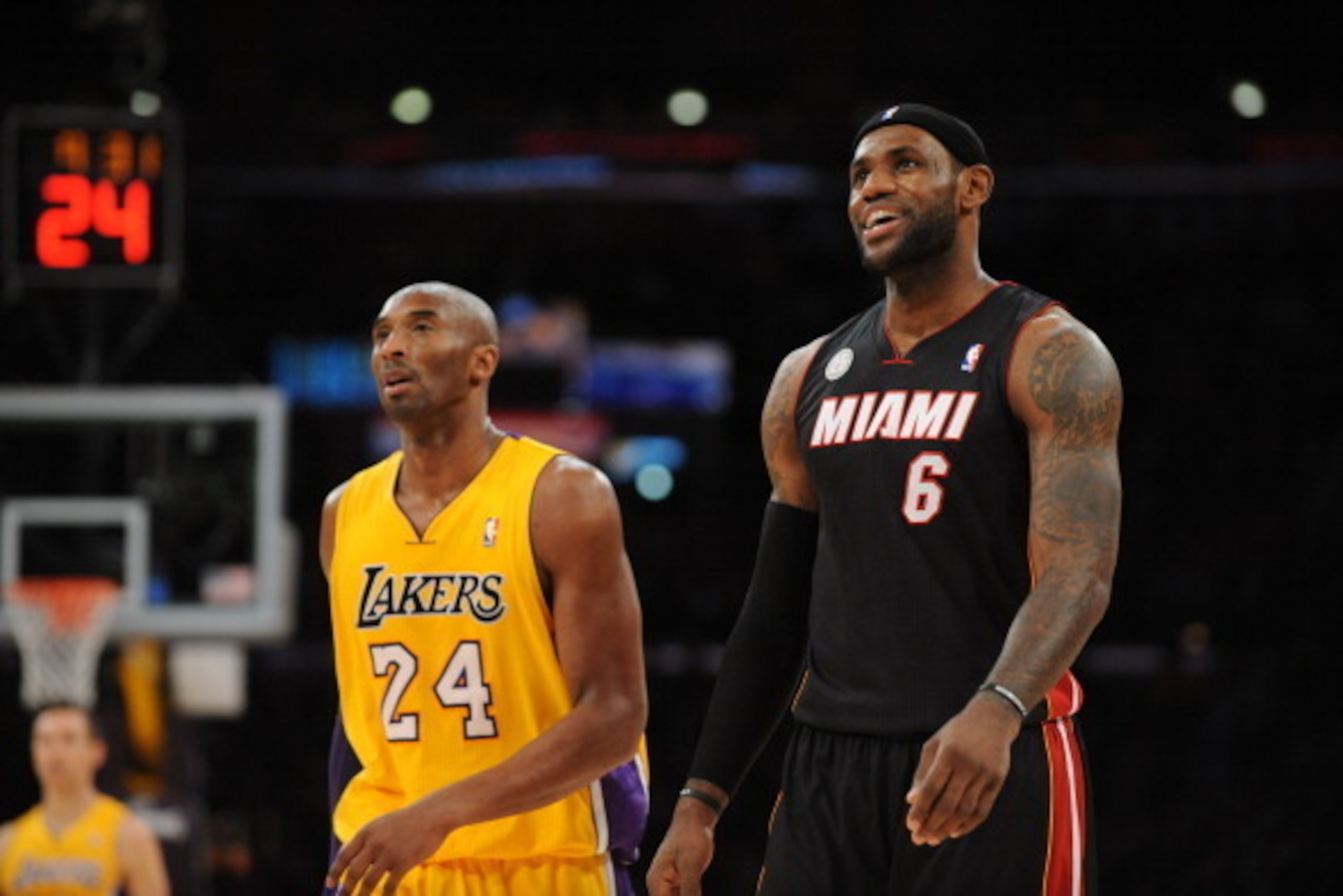 LOS ANGELES, CA - JANUARY 17: Kobe Bryant #24 of the Los Angeles Lakers and LeBron James #6 of the Miami Heat look on at Staples Center on January 15, 2013 in Los Angeles, California. NOTE TO USER: User expressly acknowledges and agrees that, by downloadi