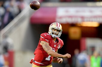 SANTA CLARA, CA - NOVEMBER 20:  Colin Kaepernick #7 of the San Francisco 49ers throws a pass against the New England Patriots in the fourth quarter of their NFL football game at Levi's Stadium on November 20, 2016 in Santa Clara, California.  (Photo by Th