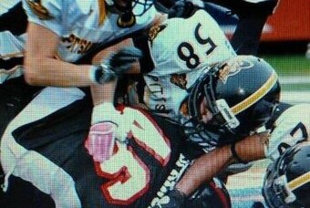 Balochko (58) makes a tackle for the Pittsburgh Passion
